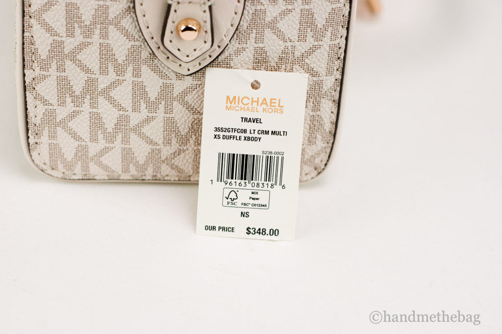 Michael Kors Travel XS Light Cream Signature PVC Duffle Crossbody Handbag